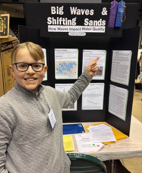 Joshua Mills with science fair project